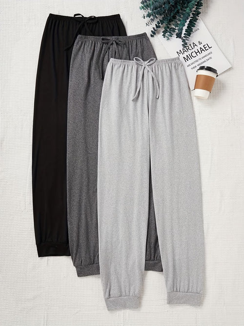 A New Minimalist Three-Color Set of Casual Women'S Pants with a Drawstring Waist, Perfect for Autumn. These Loose-Fitting Solid Home Pants Make a Great Gift